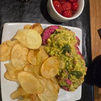 Sourdough with beetroot hummus and guacamole at Farro in Rio De Janeiro