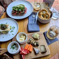 Vegan 'Brotzeit' and 'Maultaschen' with potato salad at Laut Café in Tabanan