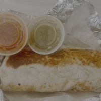 Two burritos only came with two sauces but they were tasty just wish I had moree  at La Familia Cafe in Kalamazoo