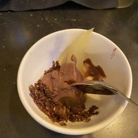 first dessert: pera con crema al cioccolato e crumble di cioccolato e amaretti  at Pierre Sang in Paris