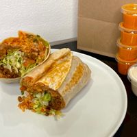 Impossible burrito (cut in half + plated at home) at Taco City in Seattle