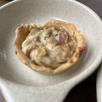Quiche de cebola caramelizada com queijo de caju  at AYUNI in Sao Sebastiao Da Feira