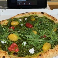 Pesto pizza … note that tomatoes are added after and are cold   at Vitale in Sitges