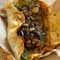 Opened Yufka to see all the ingredients and sauces inside. Big portion.   at doen doen® kebap in Berlin