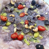Pizza Violet with potatoe cream, tomatoes, fried rosemary, cashews, potato chips  at Spaccanapoli Nr. 12 in Berlin