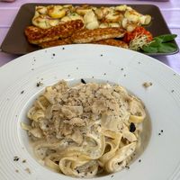 Pasta with tartufata & baked tempeh with potatoes at Artha in Porec
