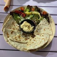 Naan with hummus  at Artha in Porec