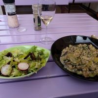 Vegan mushroom and asparagus risotto, salad and wine. All delicious and very reasonably priced. The risotto was the best I've ever had even without all the cream and cheese in a usual recipe.  at Artha in Porec