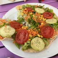 Naan with hummus & vegetables  at Artha in Porec