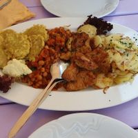 Soy medaillons, fried seitan, legumes & braised potatoes (for two) at Artha in Porec