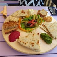 Artha platter. Spreads: hummus, red beet, spinach, tofunaise & legumes. at Artha in Porec