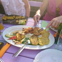 Platter in the middle, fried tofu and fried tempeh on the left at Artha in Porec