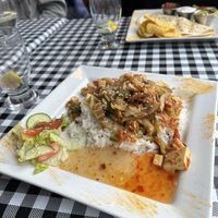 Magic Wok of Tibet with gloppy sauce and minimal salad.   at Elita - temporarily closed in Canmore