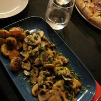 Mushroom escalopes with potatoes at Ca La Mora Italian Restaurant in Barao De Sao Joao