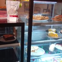 Opções de bolos, tortas e pães do dia at  Café Angélica in Porto Alegre