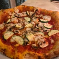 Vegan pizza with zucchini and mushrooms   at Cafeteria-Trattoria Am Rathaus in Osnabruck