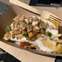 The daylily! Corn polenta with poblano peach salsa… Absolutely incredible! 🌽🌶️🍑  at Planted - Pop Up in Bloomington