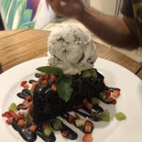 Coco cake with coconut ice cream  at La Senda Restaurante in Playa Del Carmen