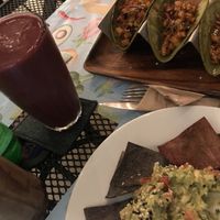 Açai omega juice, vegan chorizo tacos and guacamole  at La Senda Restaurante in Playa Del Carmen