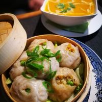 two first courses: far back - seasonal pumpking soup, up front - Momo, which is a type of South Asian dumpling at Pod Norenami in Krakow