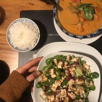 Tofu salad (too oily) and red curry with vegan ”beef" at Pod Norenami in Krakow