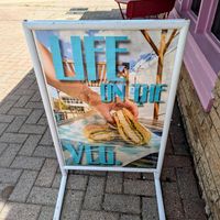 Sign in front of building at Vice Burger  in Fort Worth