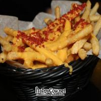 Chips with cheese and 'bacon' bits at Foodswings in Brooklyn