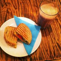 Tomato, pesto and cheese sandwich + hot chocolate with oat milk at DopHert in Amsterdam