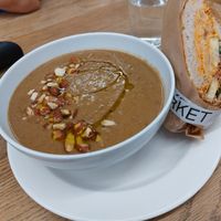 Lentil and nut soup with half sandwich at Arket Café in Helsinki