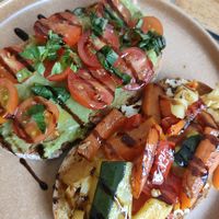 Avocado and hummus toasts at Leve Food For All in Lisbon