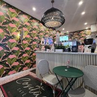 Photo of interior from google   at Cositas Cafe in New York City