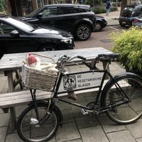 Bike with meat-shaped plushies.  at De Vegetarische Slager Shop in Rotterdam