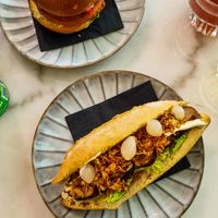 Burger and hot dog at De Vegetarische Slager Shop in Rotterdam