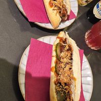 Vegan rendang sandwich en vegan indische bal broodje. Degene met komkommer is de Indische bal. at De Vegetarische Slager Shop in Rotterdam