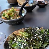 Small dumpling soup and green seaweed covered tofu   at Cham  in Hamburg