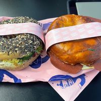 Protein Bagel with lupin cheese and pretzel bagel with ham at Bakery Bakery - Basel SBB in Basel