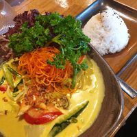 Yellow tofu curry served with rice at Jadevie Cuisine in Rosenheim