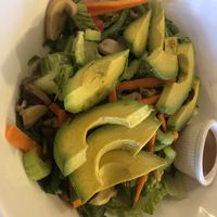 Lettuce, tomato, pepper, carrots, avocado, cucumber, pickled mushroom salad   at Bella Napoli  in Copiague