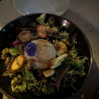 Buratta dish at Les Mauvaises Herbes in Quebec