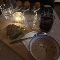 Arancini (back) and onion soup  at Les Mauvaises Herbes in Quebec