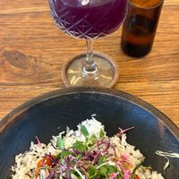 Sticky eggplant and tofu and butterfly pea kombucha  at Jhoii Local Eats in Sanur