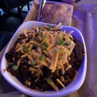 Vegan chili with dairy-free cheese.  at The Five6 in Rogers