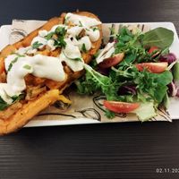 Baked batat and salad at Corgi's Cafe in Sofia