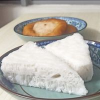 Steamed rice cake in the front, fried dough pancake in the back  at Pan Cake and Steam Rice Cake Stall in Penang