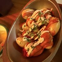 Patatas bravarissas  at Faire Tapas & Wine in Barcelona