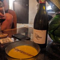 Pumpkin coconut milk soup at Aliado Bar & Aperitivo in San Juan