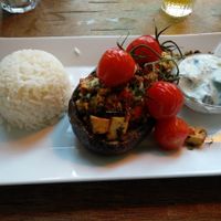 amazing dish: aubergine filled with tofu, with basmati rice and vegan tzatziki on the side at Studio K in Amsterdam