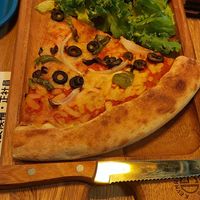 Vegetable pizza slice at Falafel Brothers - Otemachi in Tokyo