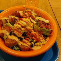 American salad bowl, complete with hard falafel hockey pucks 😞 at Falafel Brothers - Otemachi in Tokyo