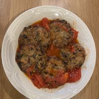 Mushroom patties in tomato sauce   at Tiệm trà Lê La - Le La Vegan in Cao Bang